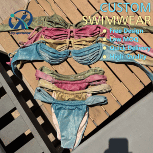 Joy Sportwear AUTO-DRAFT swimwear. Shimmering bikini sets in green, pink, gold, and blue. Two-piece swimsuits.