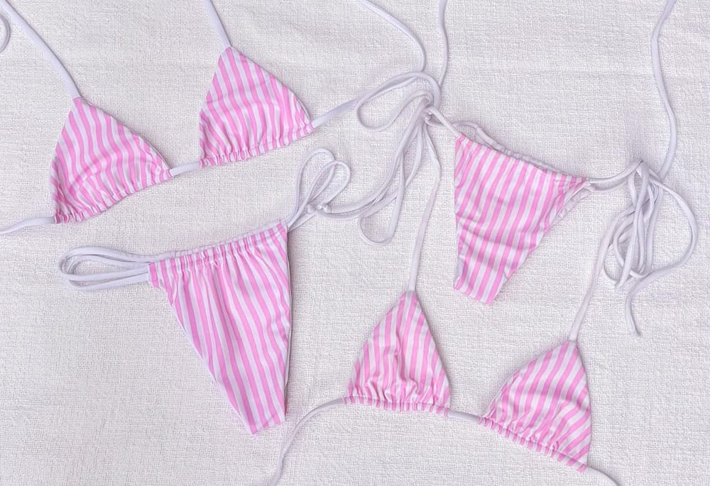 Pink striped string bikini set showing bikini size proportions for top and bottom fit in swimwear production